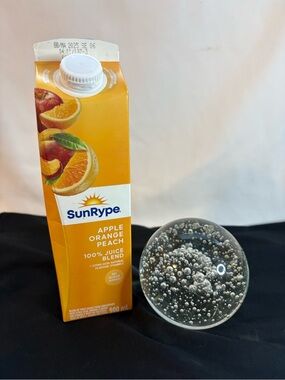 Large round controlled bubble paperweight